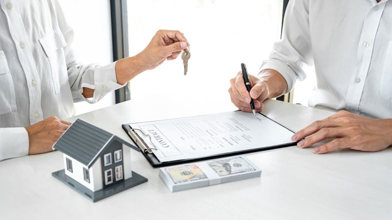 Real estate agent closing a deal smoothly with digital transaction management