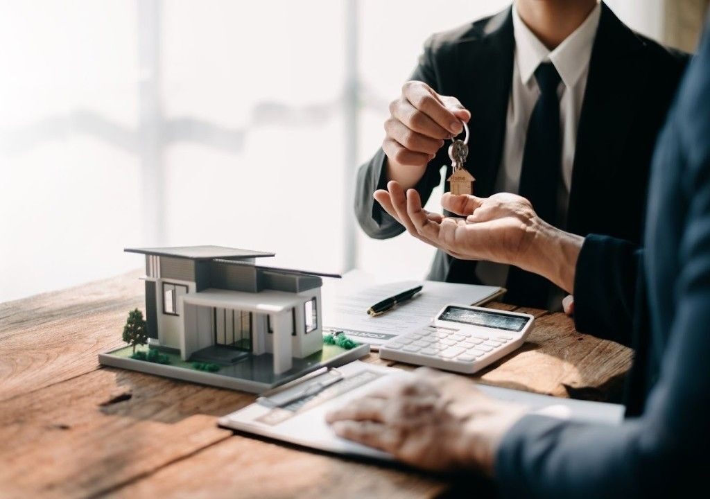 Agent closing a property deal using real estate tracking software