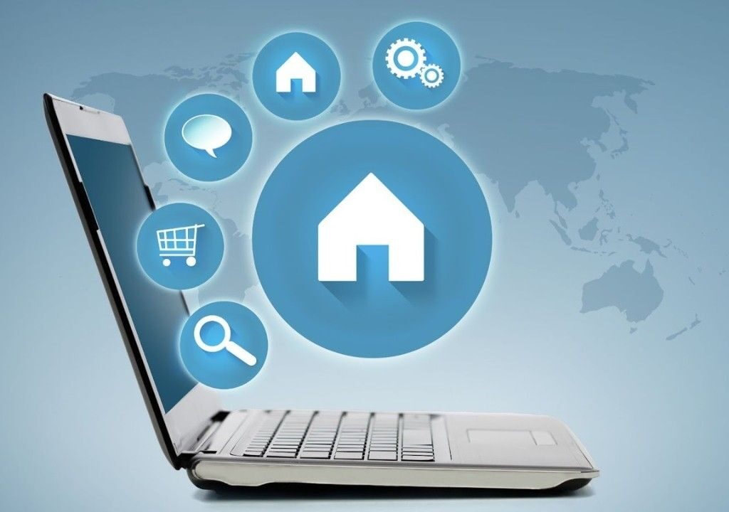 Laptop displaying workflow automation and communication tools in a real estate tracking system